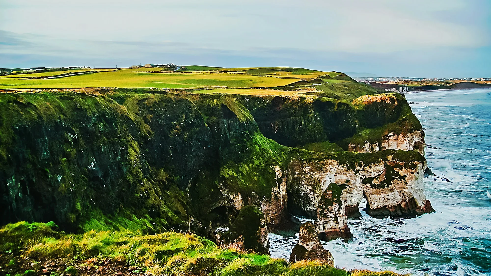Green cliffs above the sea in Northern Ireland